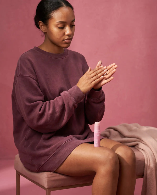 Warm and press into skin